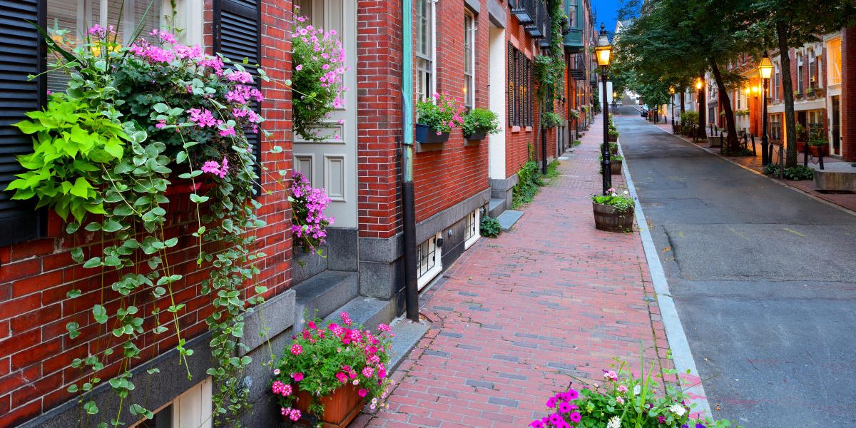 header_about_boston_neighborhoods_default_beacon_hill_street_flowers_40bd8da0-90a9-44b9-84ef-78a566f57e4e.jpg